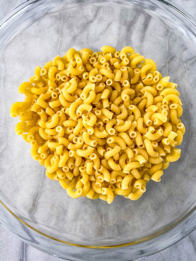 cooked macaroni pasta in a glass bowl