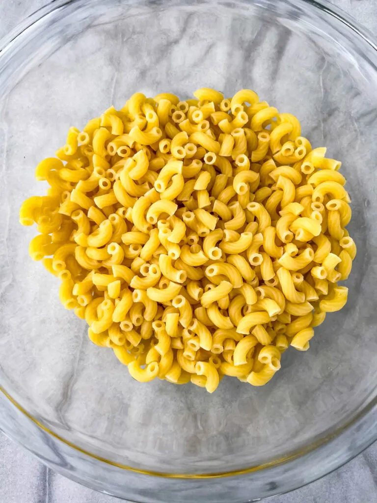 cooked macaroni pasta in a glass bowl