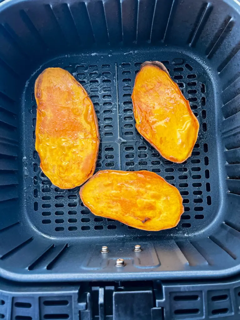 sliced sweet potatoes in an air fryer