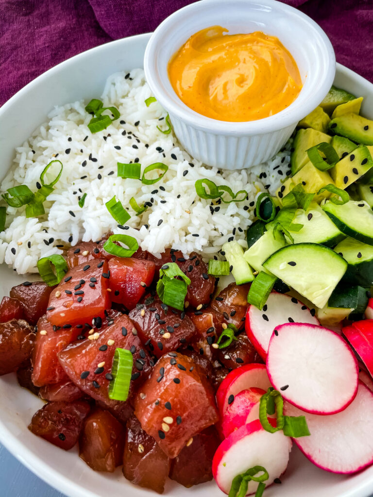 ahi tuna poke in a white bowl