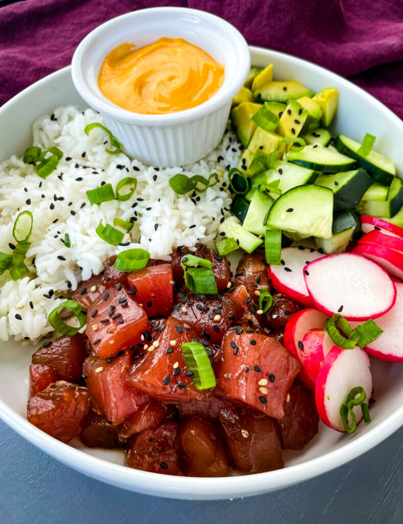 ahi tuna poke in a white bowl