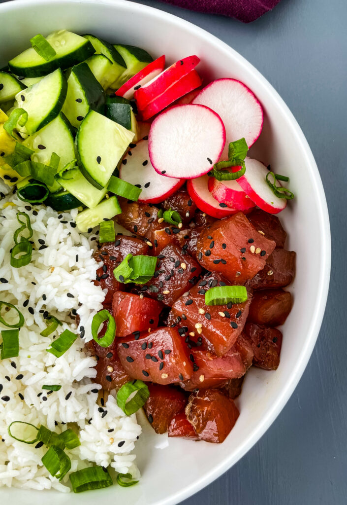 ahi tuna poke in a white bowl