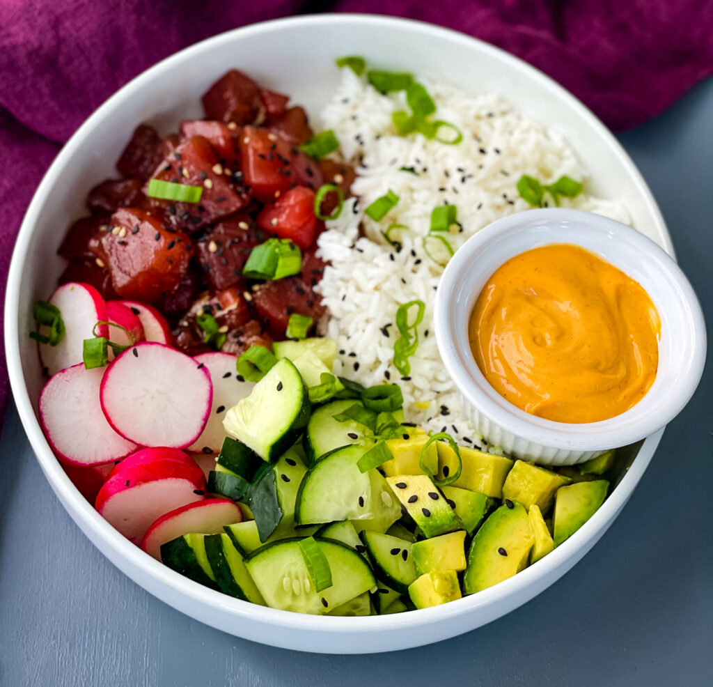 ahi tuna poke in a white bowl