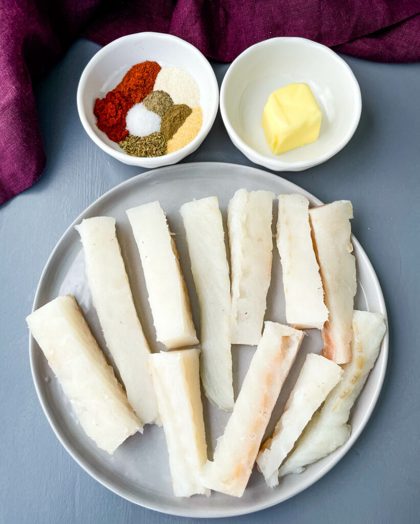 sliced, raw cod fish and blackened seasoning