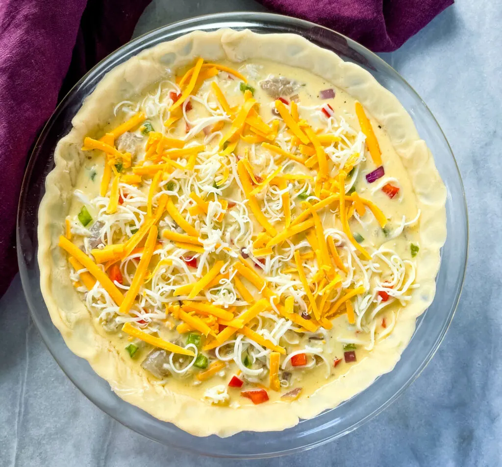 crab seafood quiche in a pie pan unbaked
