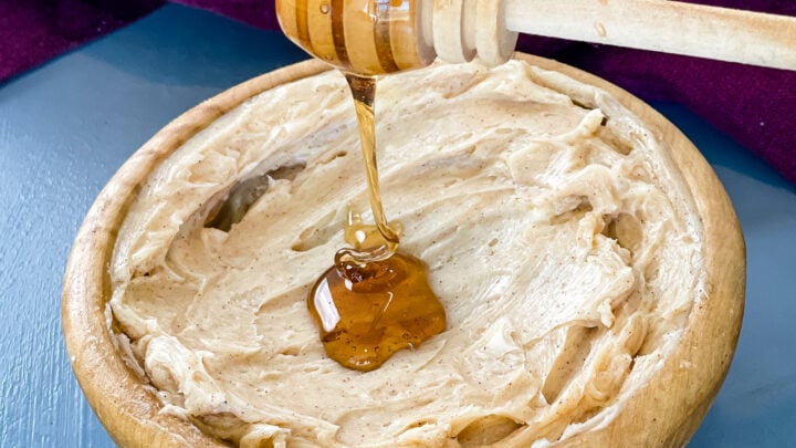 maple butter in a bowl drizzled with maple syrup