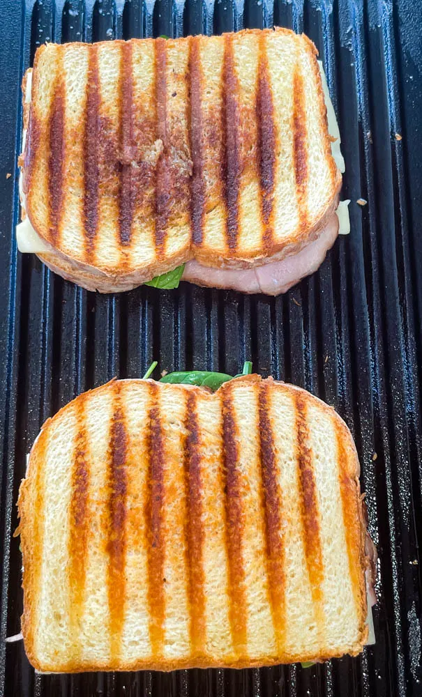 ham and cheese panini sandwich on a grill pan