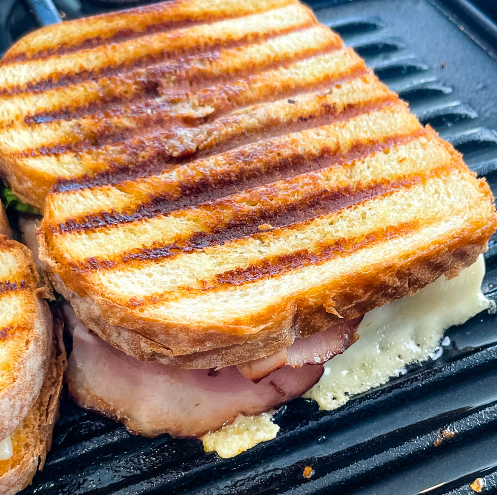 ham and cheese panini sandwich on a grill pan