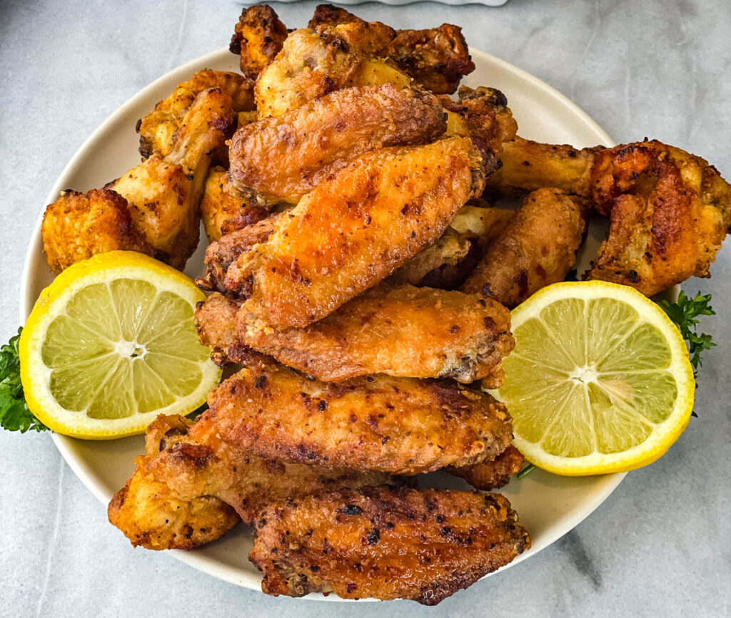 lemon pepper chicken wings on a plate