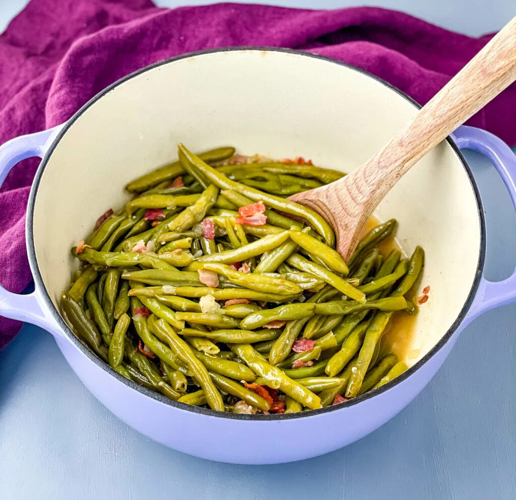 southern green beans in a purple Dutch oven