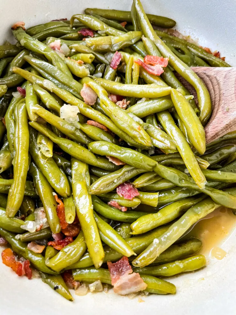 southern green beans in a purple Dutch oven