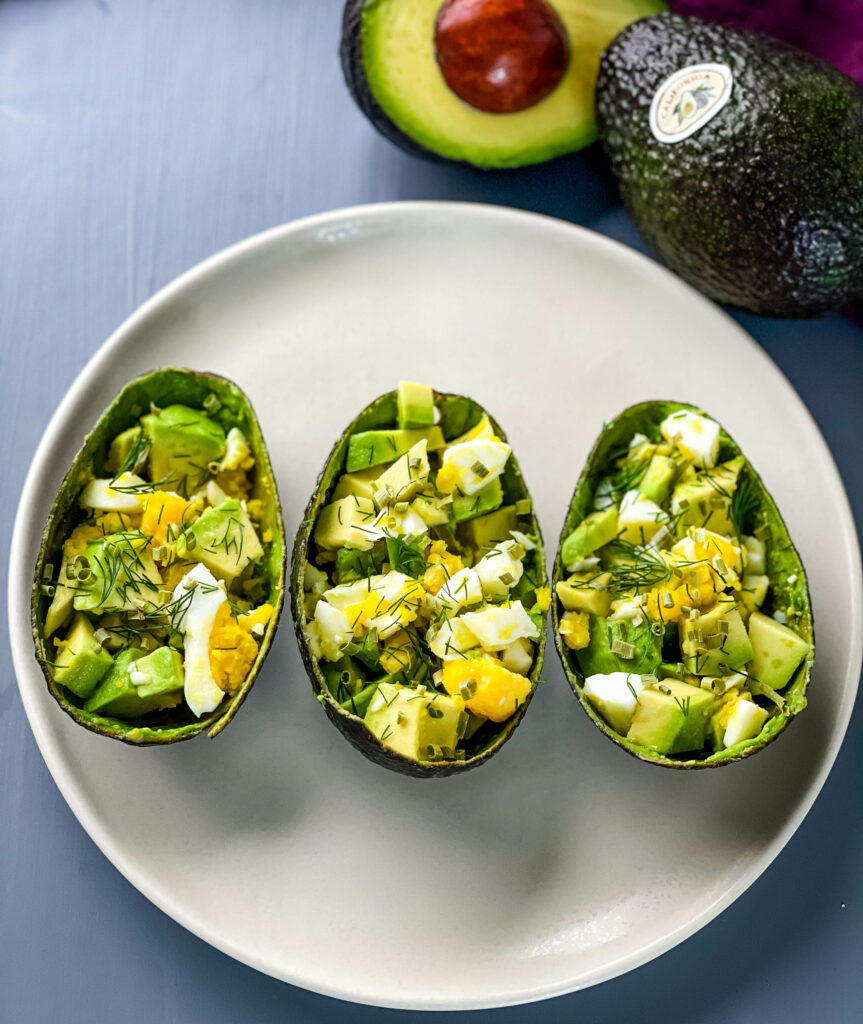 avocado egg salad cups on a plate