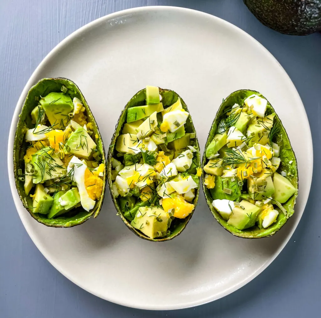 avocado egg salad cups on a plate