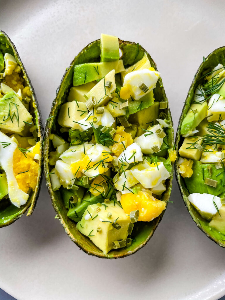 avocado egg salad cups on a plate