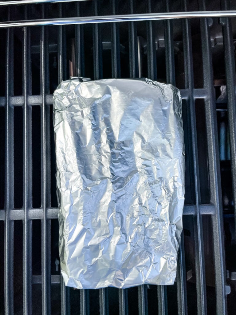 fasparagus on a grill wrapped in foil
