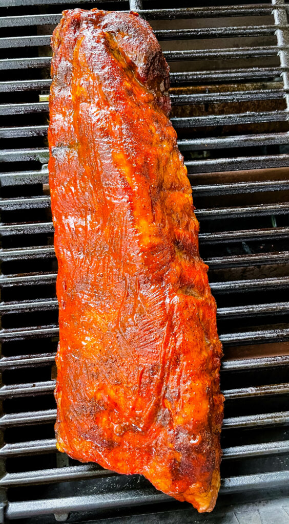 BBQ baby back ribs on a grill