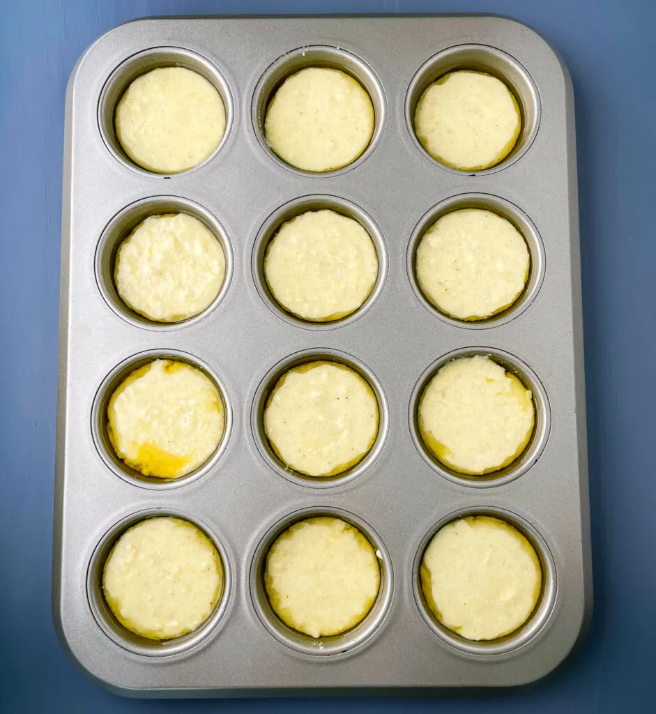 cornbread batter in a muffin tin