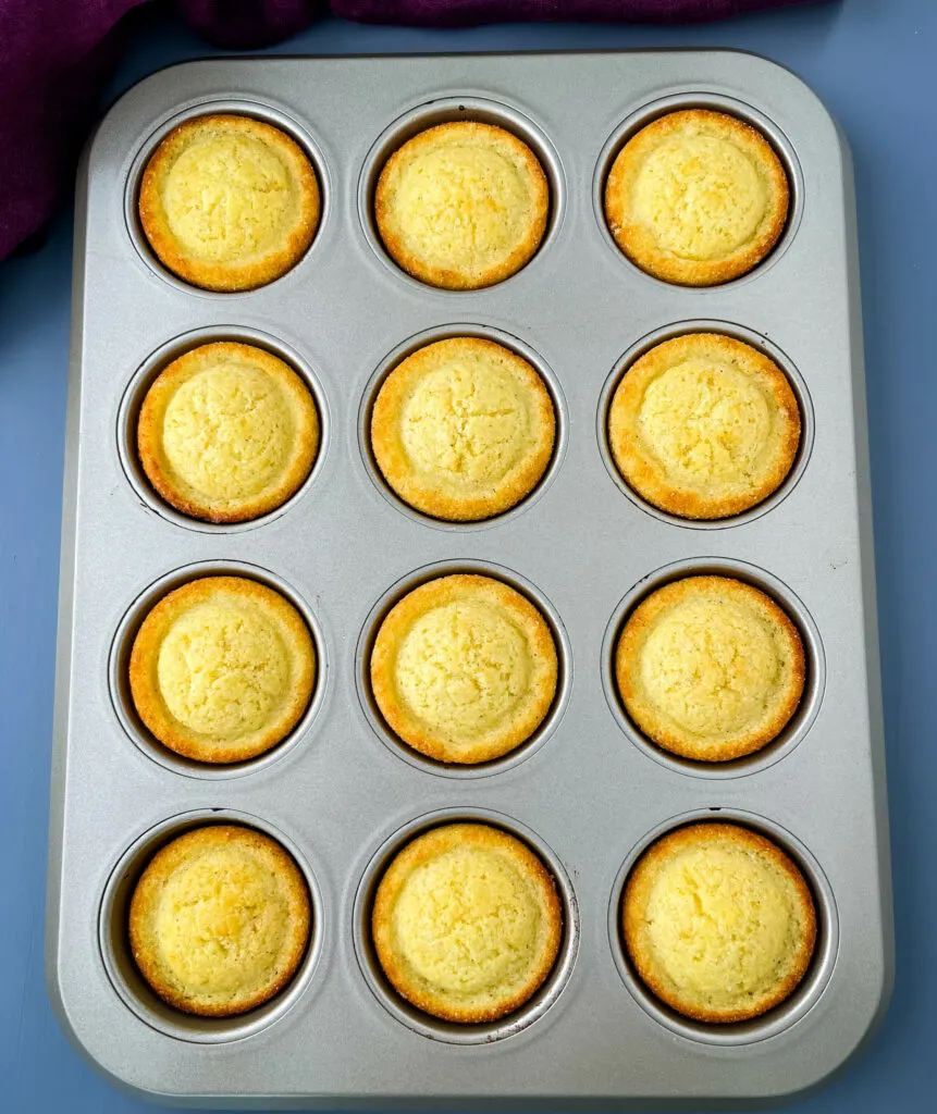 baked cornbread muffins in a muffin tin