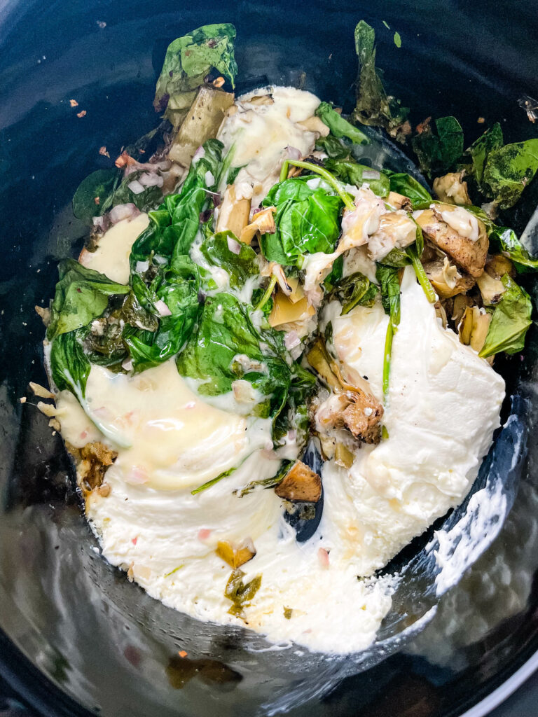 bacon spinach artichoke dip in a slow cooker