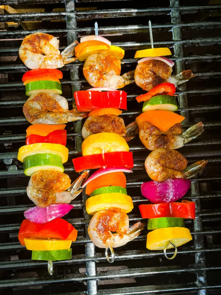 BBQ grilled shrimp skewers on a grill