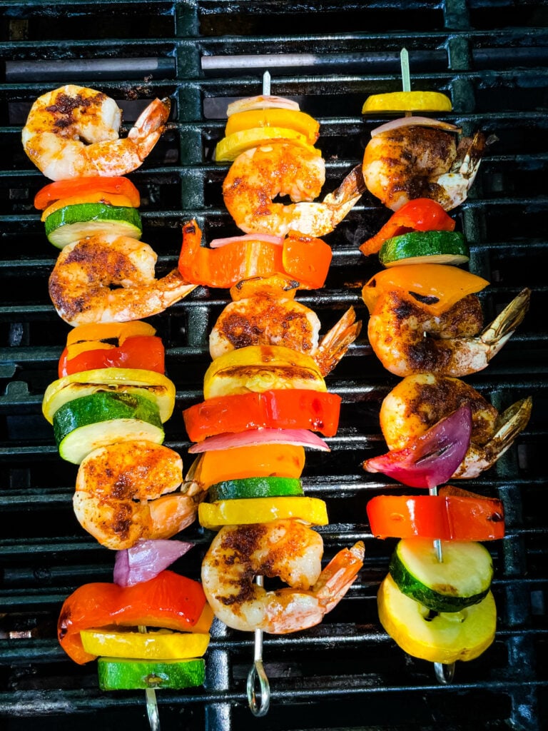 BBQ grilled shrimp skewers on a grill