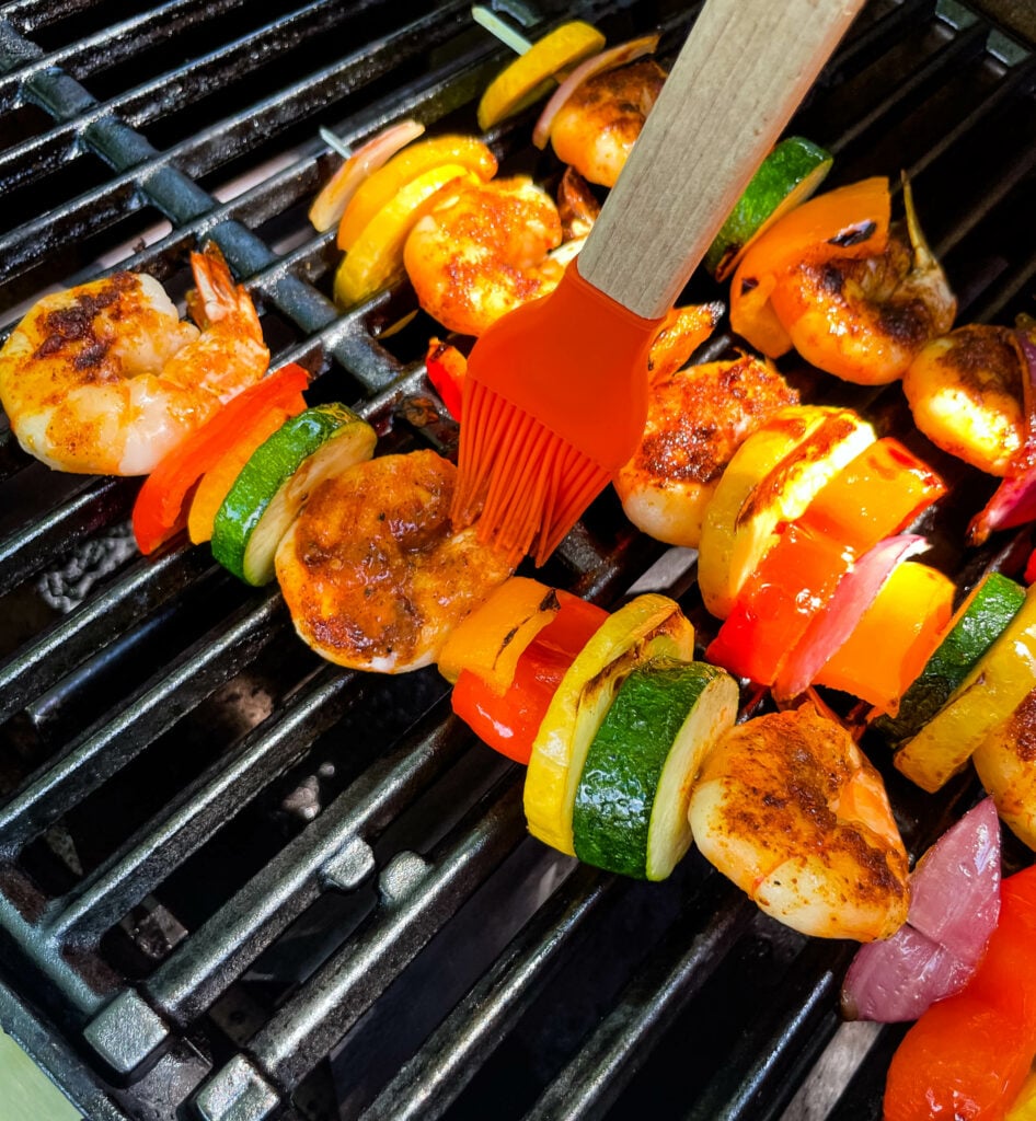 BBQ grilled shrimp skewers on a grill