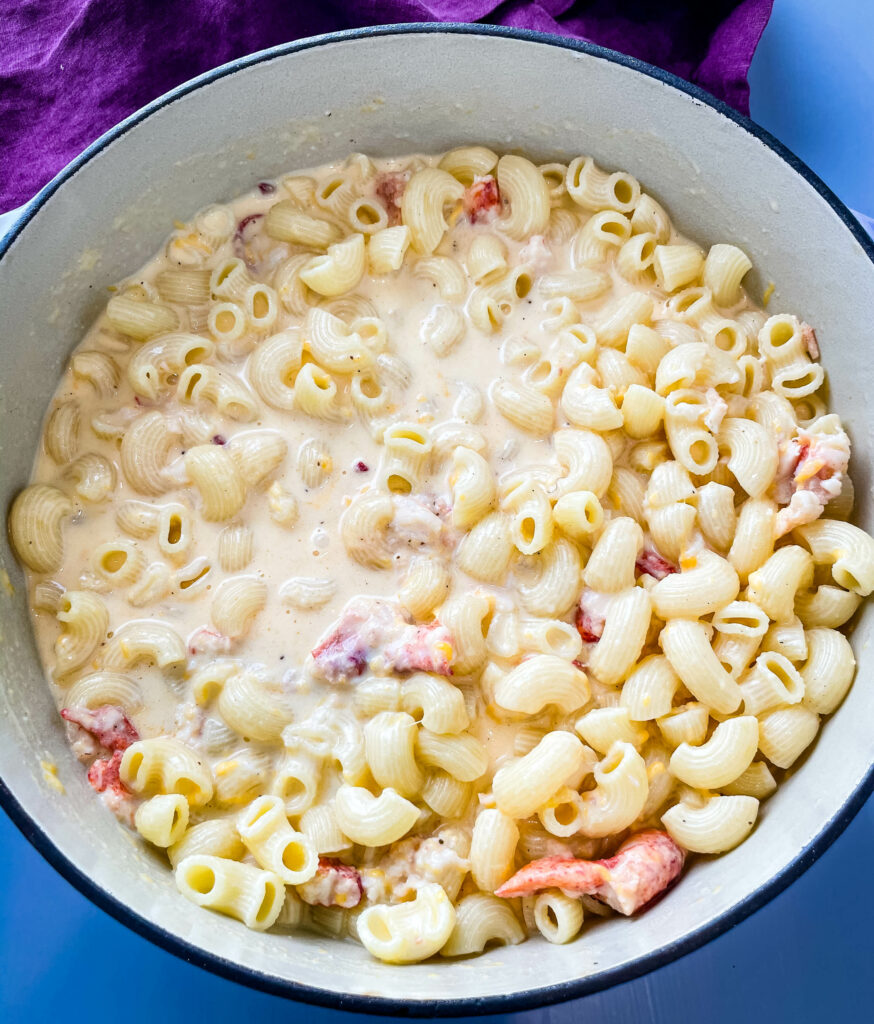 uncooked lobster mac and cheese in a large pot