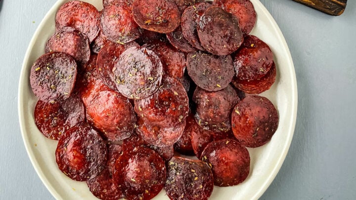 pepperoni chips on a plate with ranch