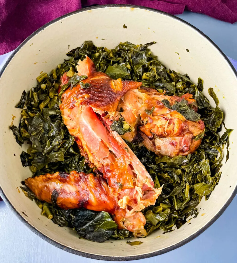 collard greens and smoked turkey in a pot