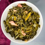 southern collard greens in a white bowl