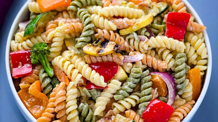 vegetable pasta salad in a white bowl