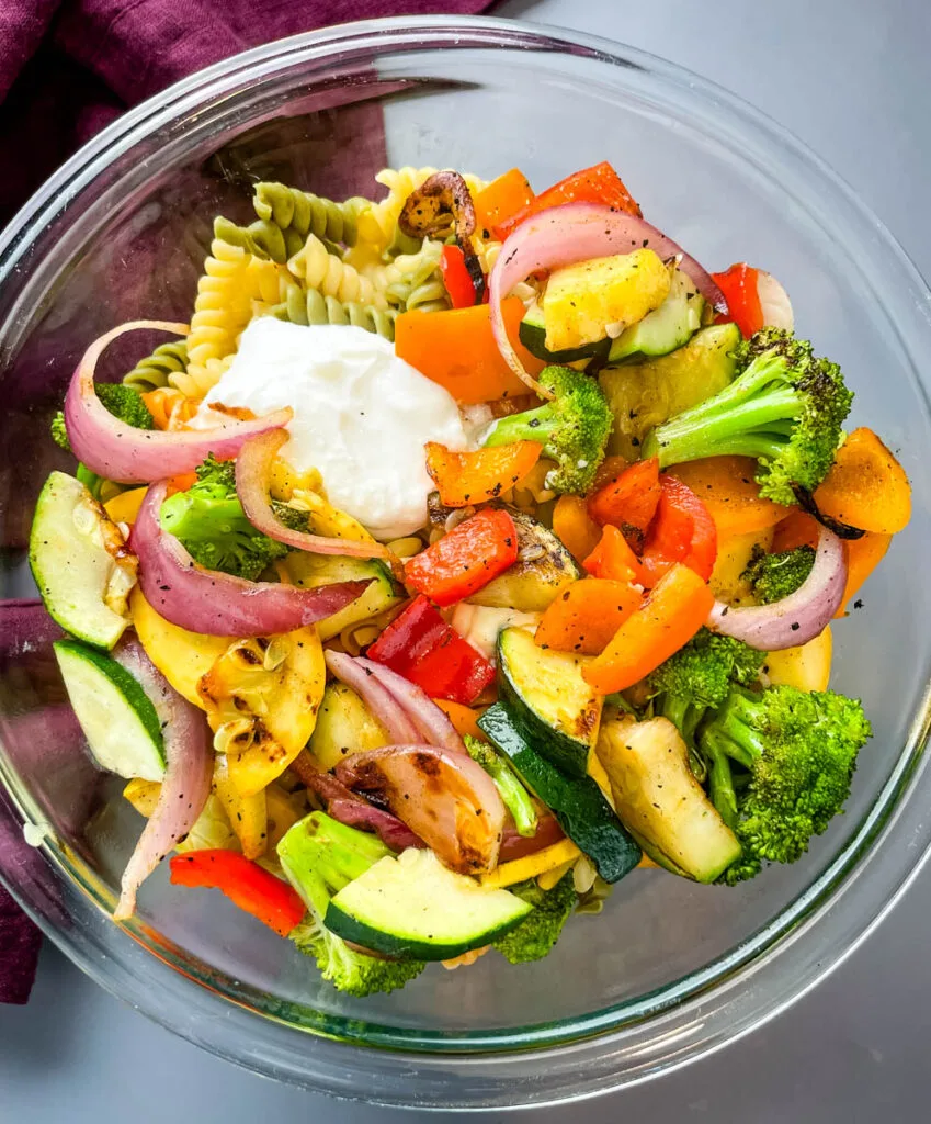 vegetable pasta salad in a glass bowl