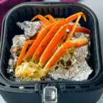 crab legs in an air fryer with foil