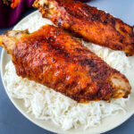 air fryer turkey wings and rice on a plate