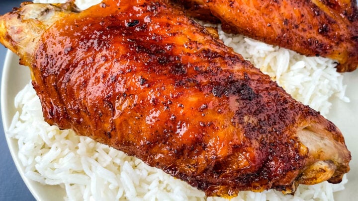 air fryer turkey wings and rice on a plate