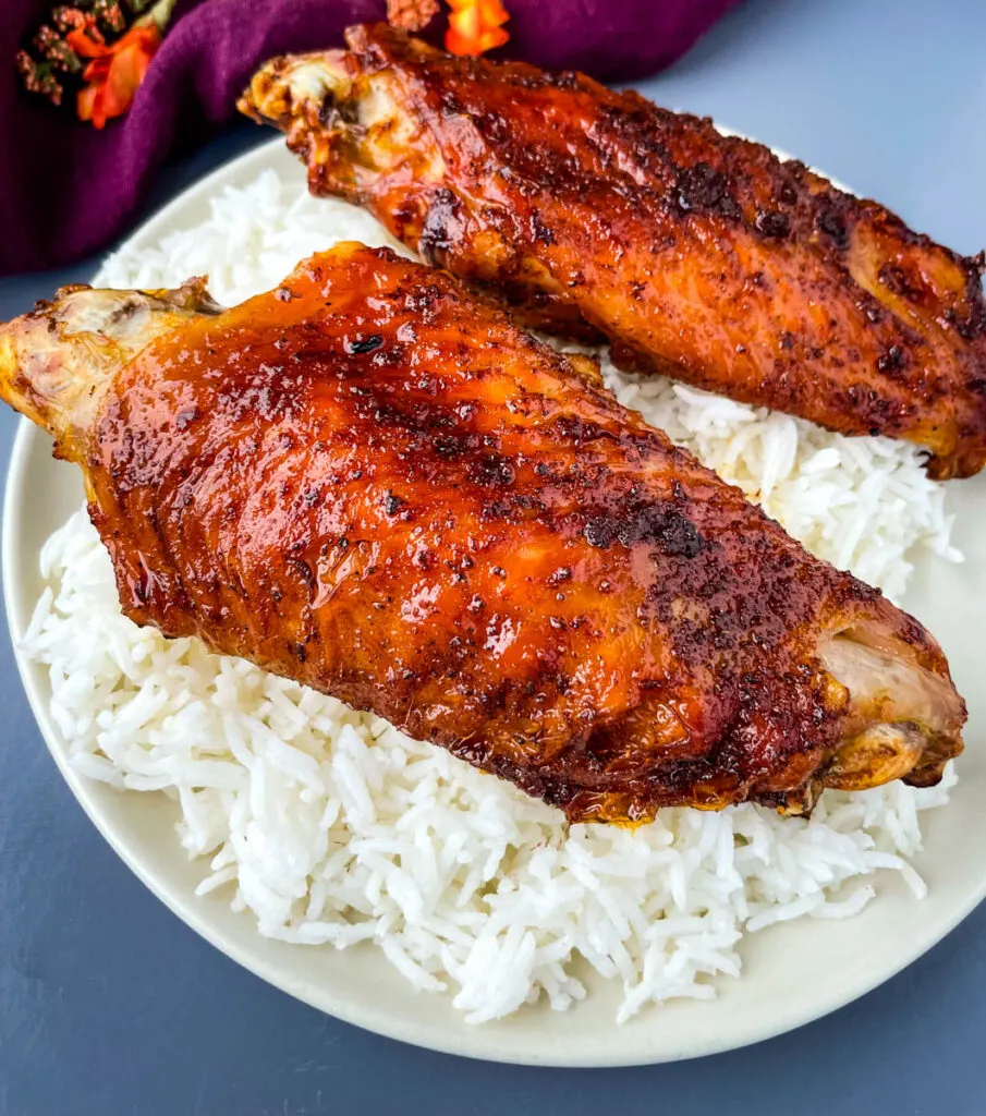 air fryer turkey wings and rice on a plate