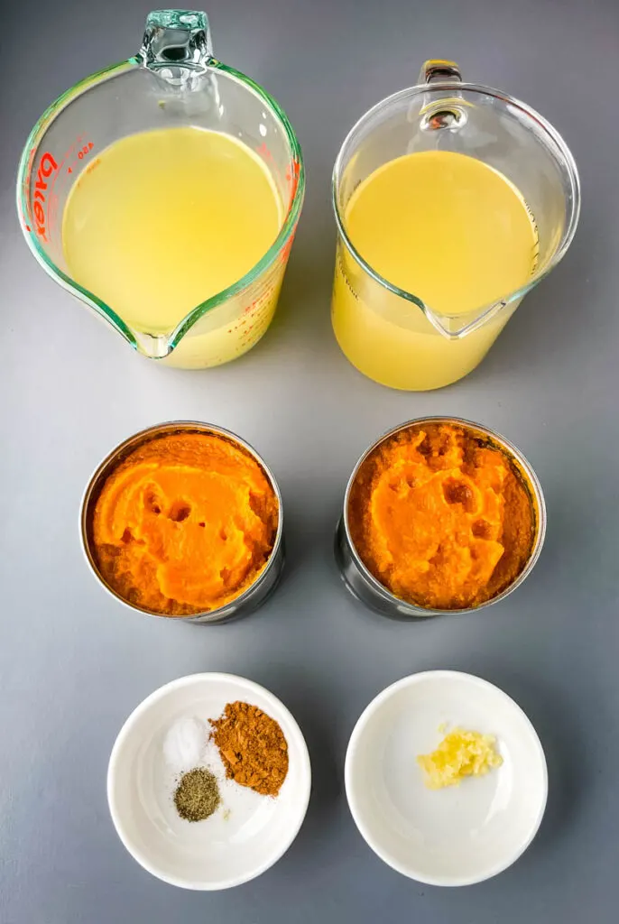 broth, canned pumpkin, pumpkin pie spice, and garlic in separate bowls