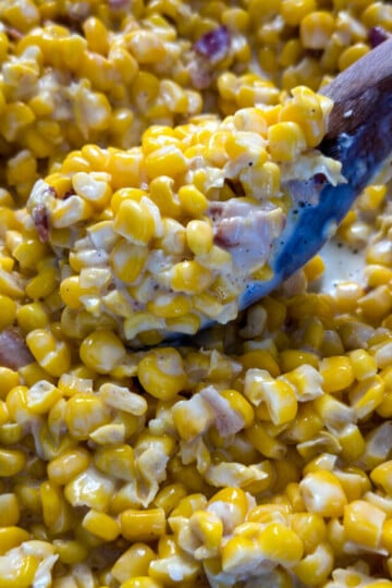 southern creamed corn in a spoon and skillet