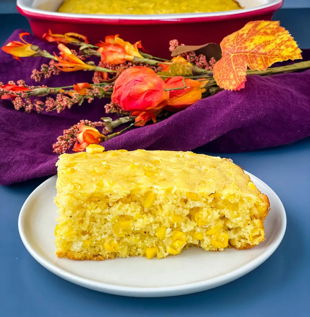 homemade cornbread casserole on a white plate