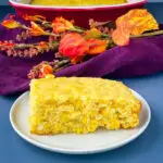 homemade cornbread casserole on a white plate