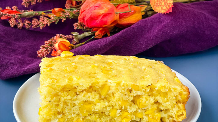 homemade cornbread casserole on a white plate