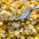 southern creamed corn in a spoon and skillet