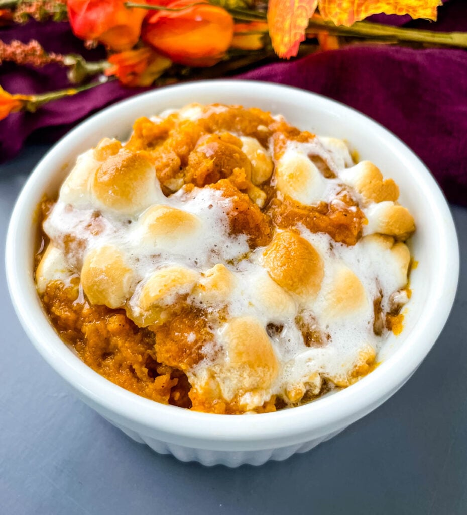 sweet potato casserole with marshmallows in a white dish