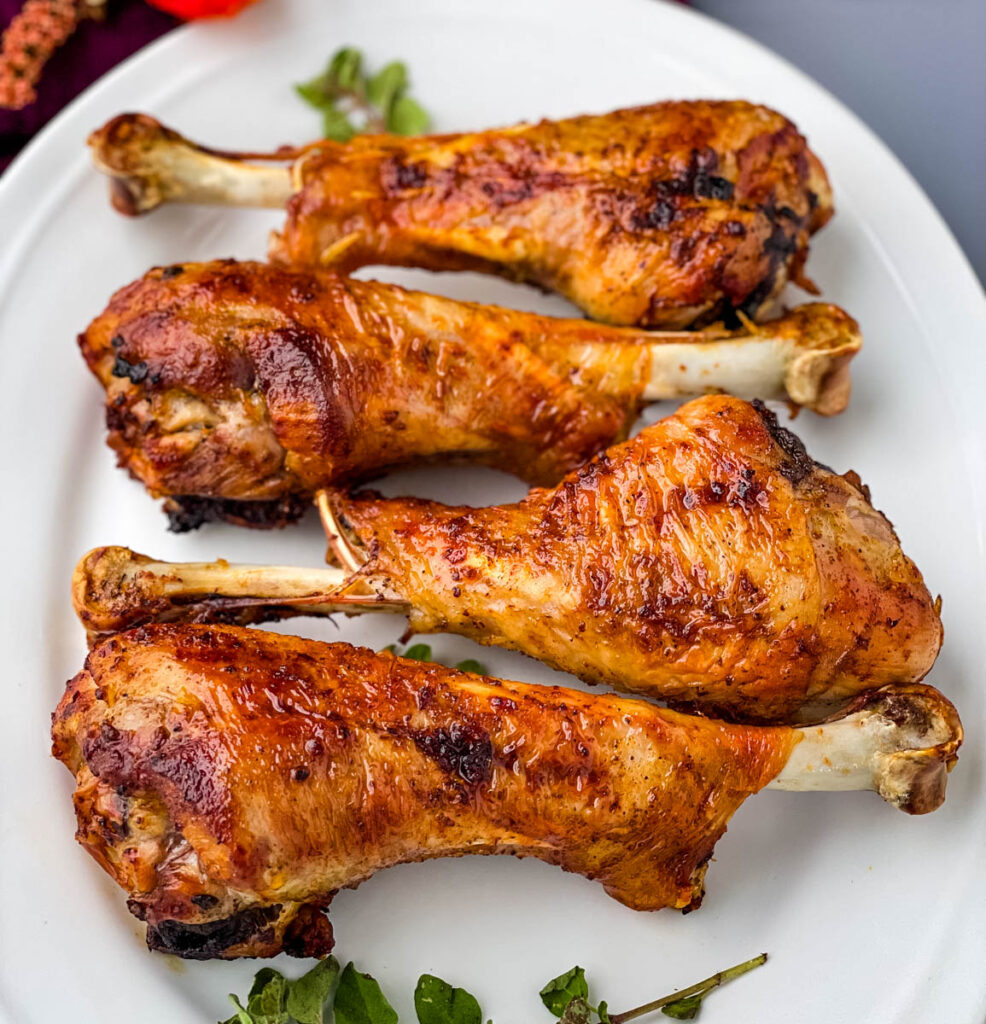 air fryer turkey legs on a white plate