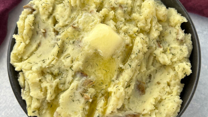 ranch mashed potatoes in a bowl with butter