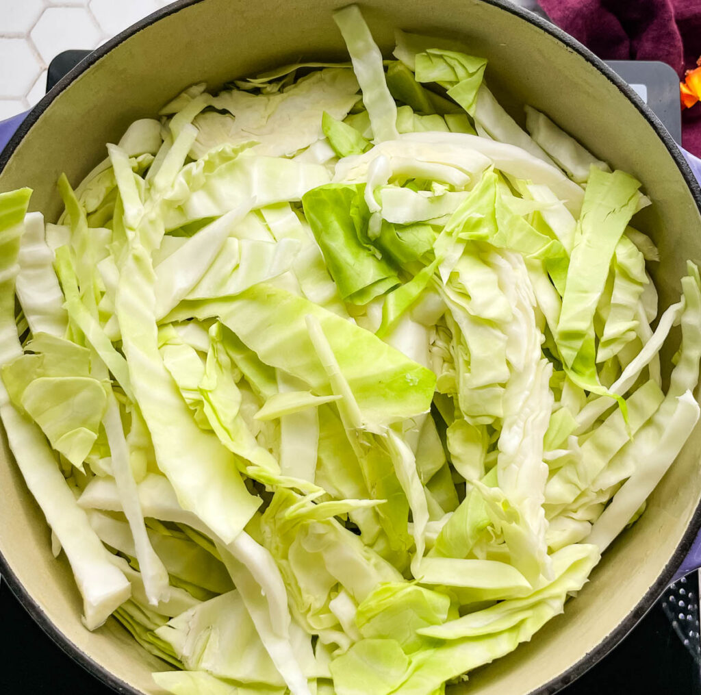 uncooked southern soul food cooked cabbage in a large pot