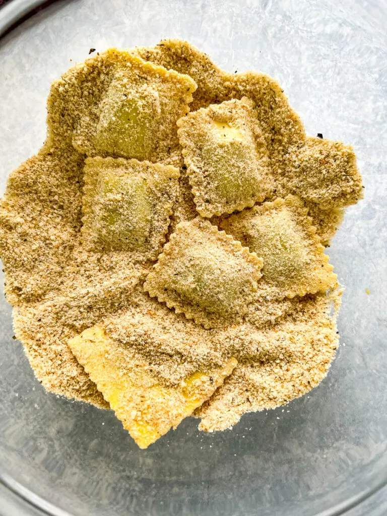 ravioli coated in breadcrumbs and eggs