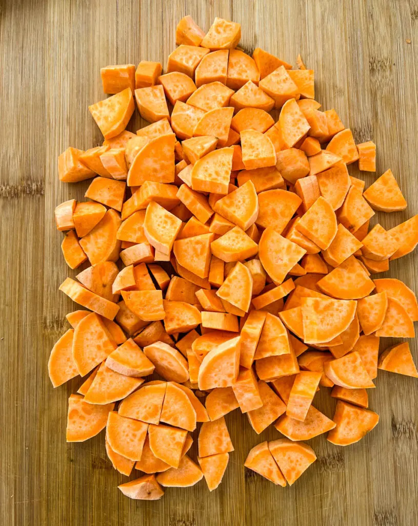 sliced and cut sweet potatoes on a cutting board