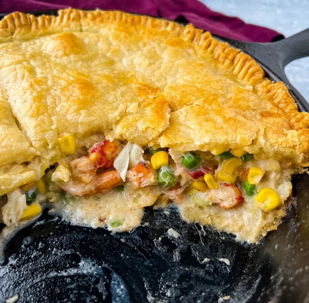seafood pot pie baked in a cast iron skillet