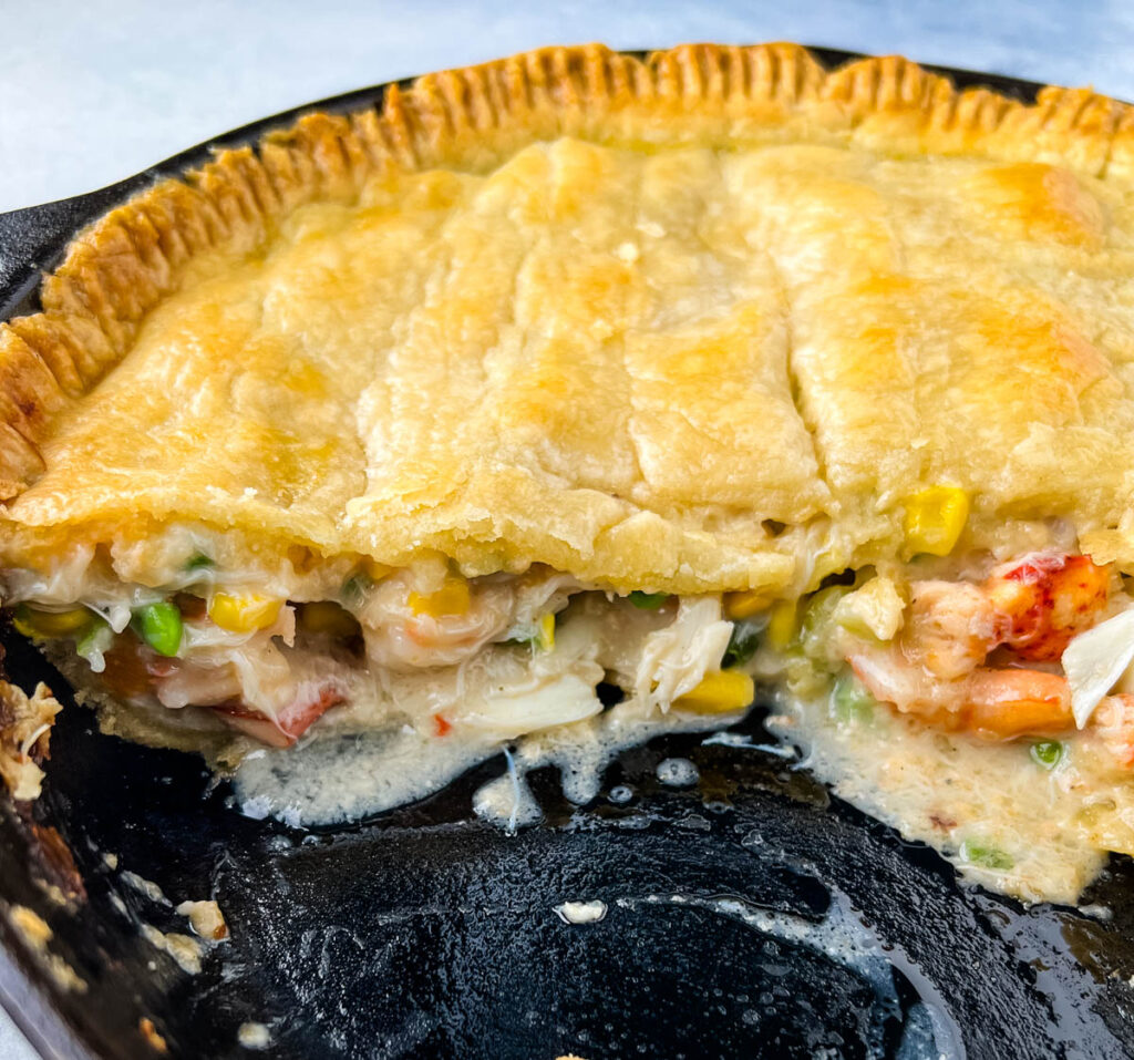 seafood pot pie baked in a cast iron skillet